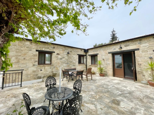 Two stone bungalows with 5 bedrooms on one plot