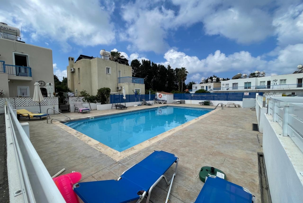 Ground-Floor Apartment with Private Outdoor Area and Communal Swimming Pool