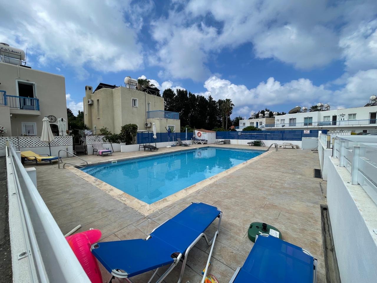 Ground-Floor Apartment with Private Outdoor Area and Communal Swimming Pool