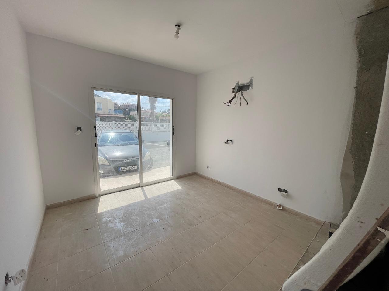 Ground-Floor Apartment with Private Outdoor Area and Communal Swimming Pool