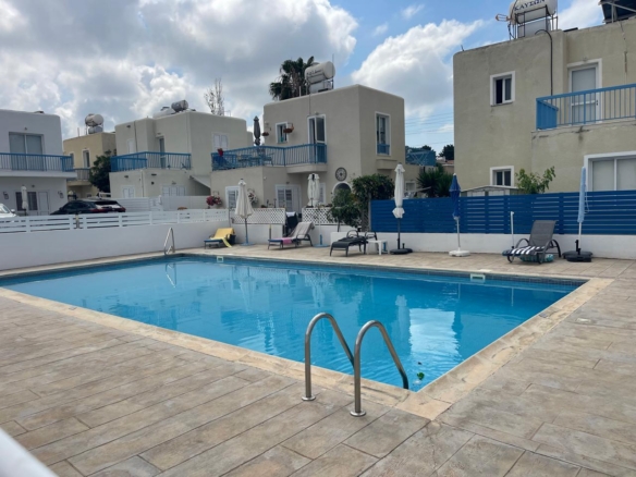 Ground-Floor Apartment with Private Outdoor Area and Communal Swimming Pool
