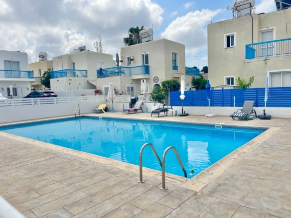 Ground-Floor Apartment with Private Outdoor Area and Communal Swimming Pool