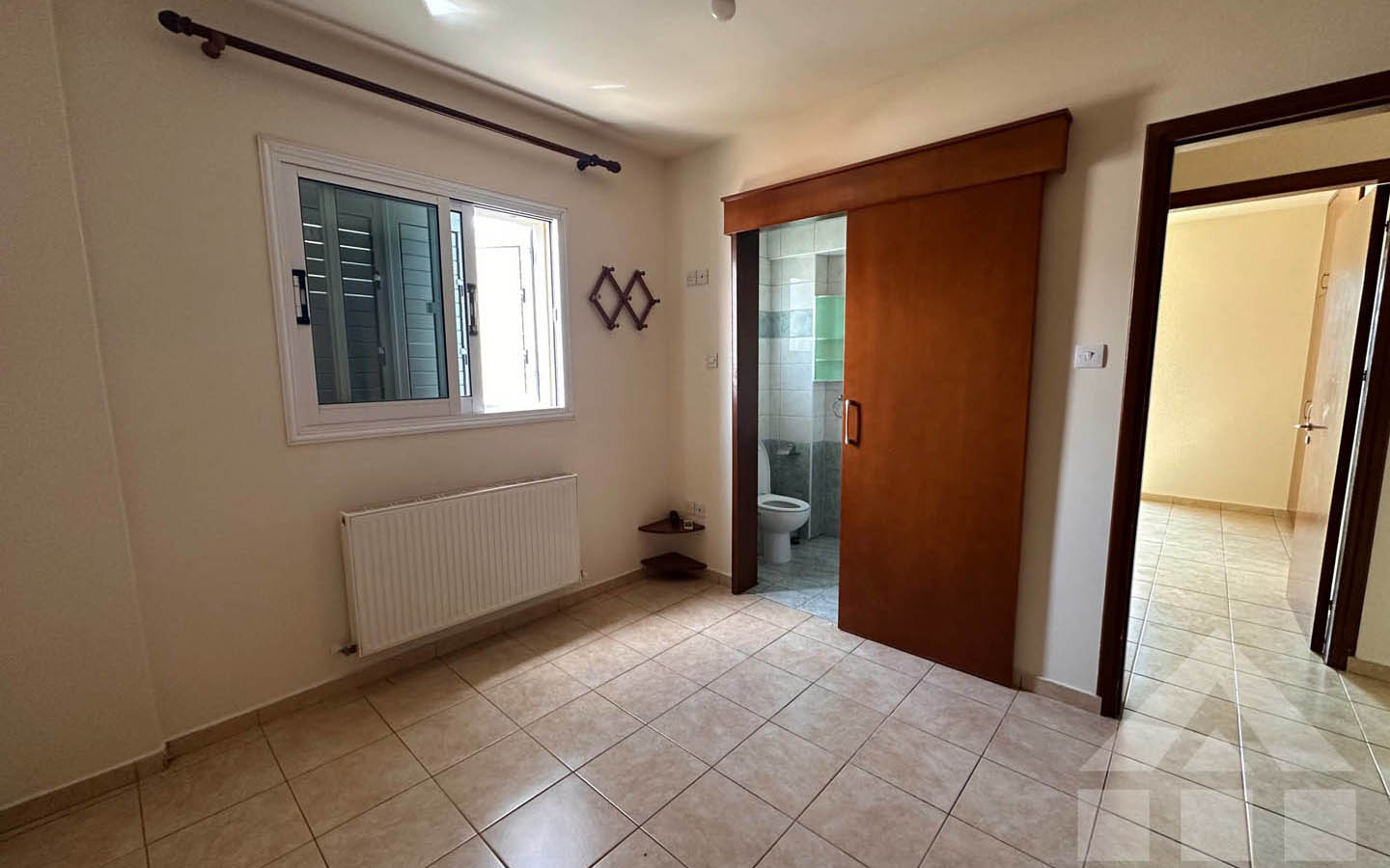 nice-apartment-for-sale-larnaca-cyprus7 3-Bedroom Apartment with a Spacious Balcony and Views of Green Surroundings
