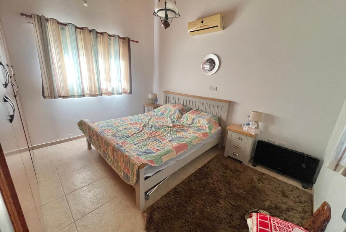 Two stone bungalows with 5 bedrooms on one plot