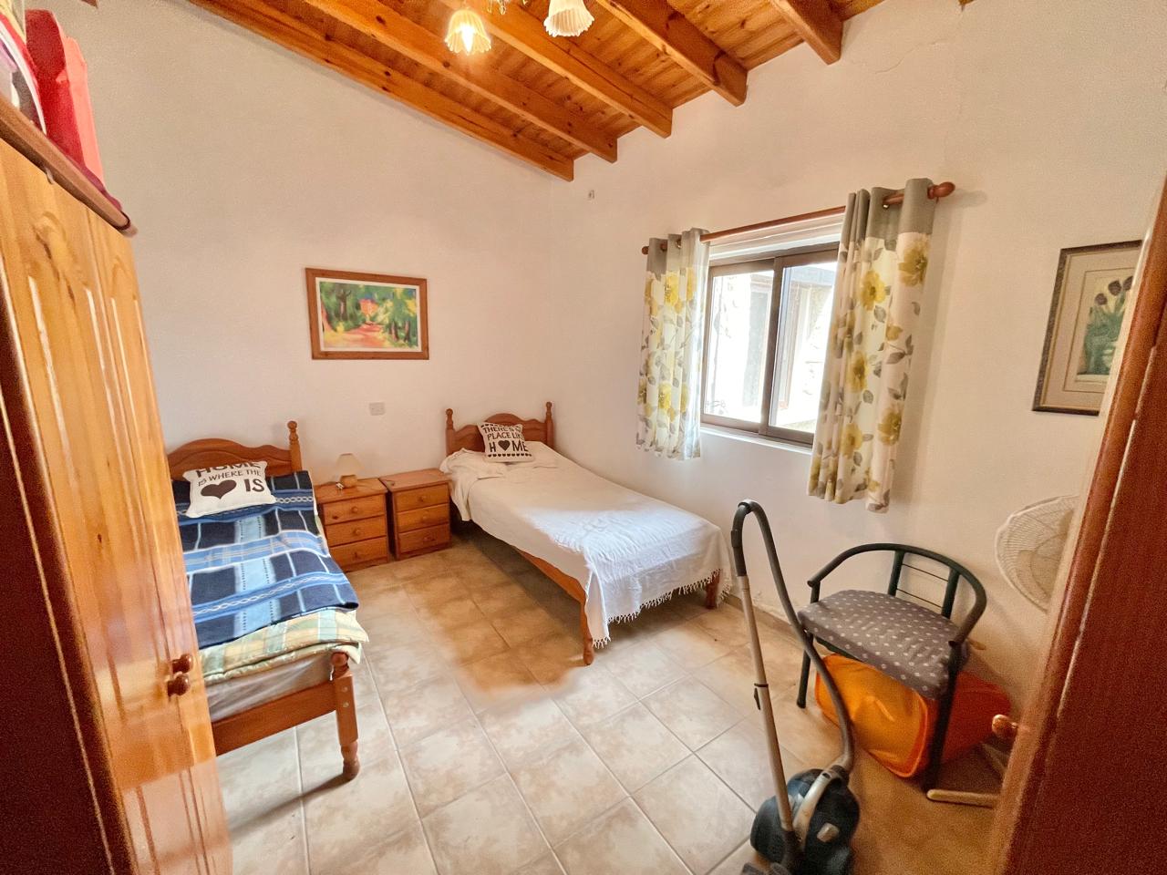 Two stone bungalows with 5 bedrooms on one plot