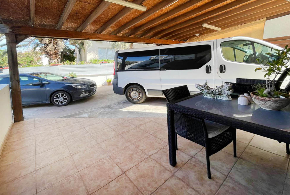 3-Bedroom Townhouse with a Private Veranda and Covered Parking