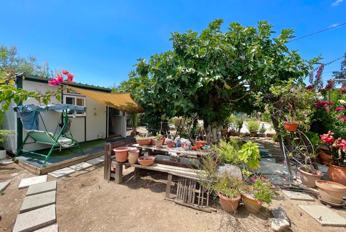 Traditional 3-Bedroom Stone Bungalow Surrounded by a Mature Garden