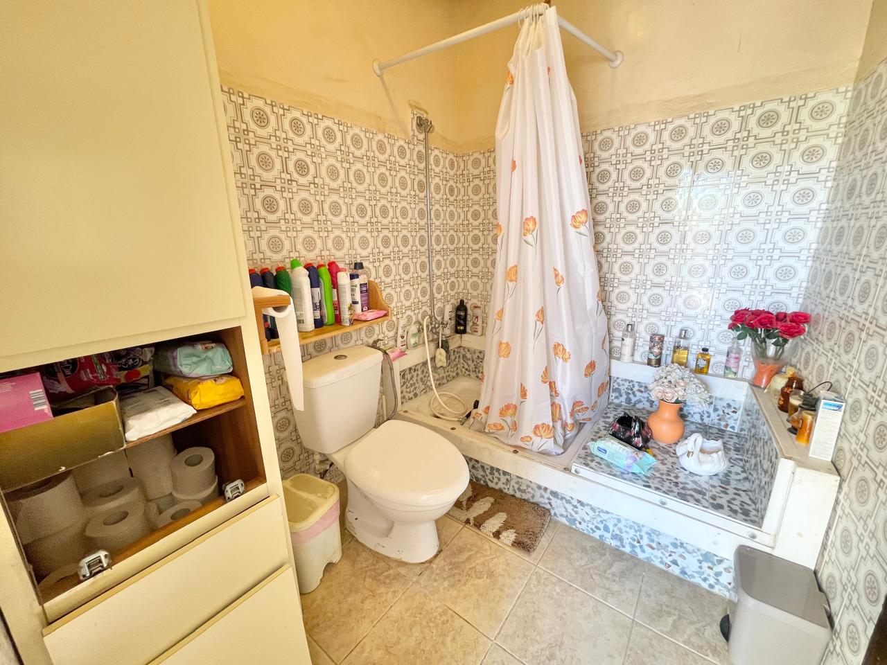 Traditional 3-Bedroom Stone Bungalow Surrounded by a Mature Garden