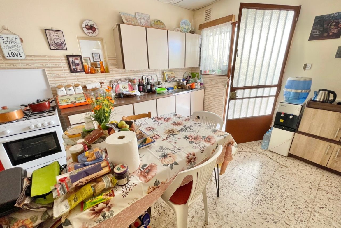 Traditional 3-Bedroom Stone Bungalow Surrounded by a Mature Garden