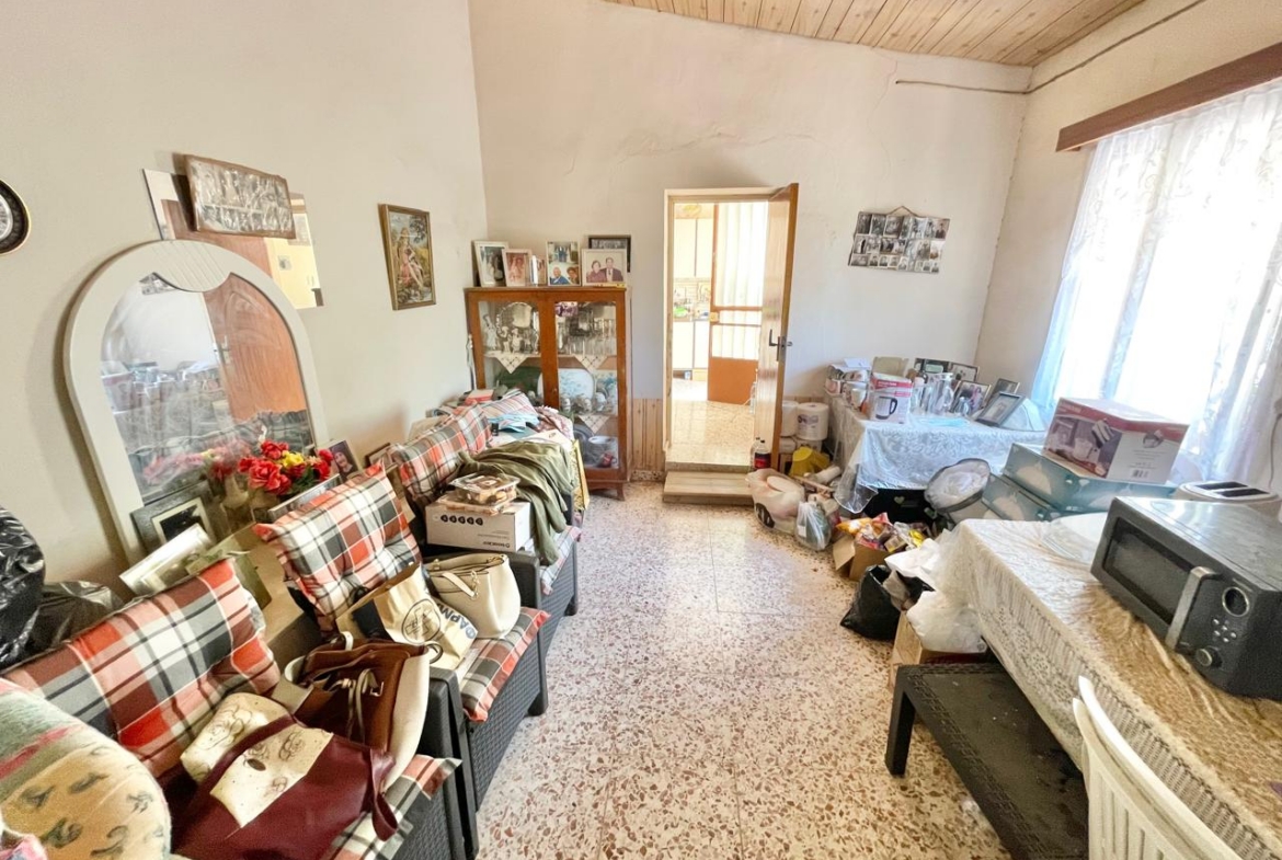 Traditional 3-Bedroom Stone Bungalow Surrounded by a Mature Garden