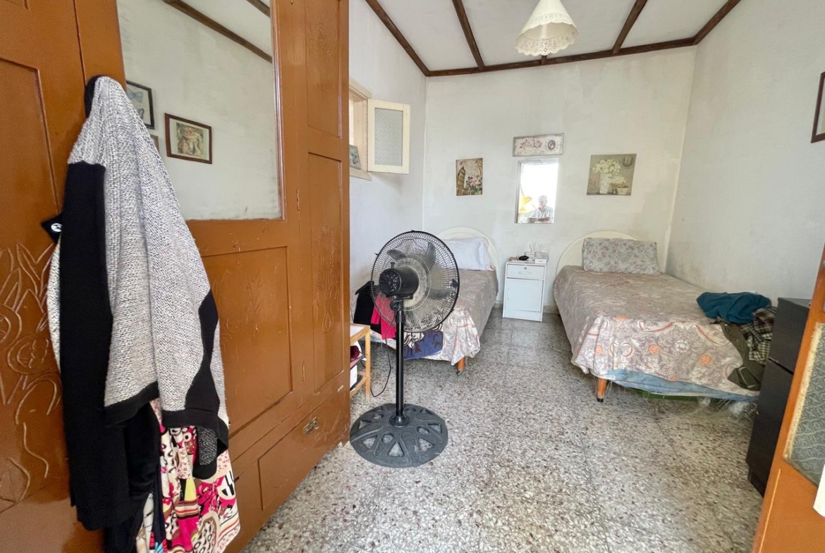 Traditional 3-Bedroom Stone Bungalow Surrounded by a Mature Garden