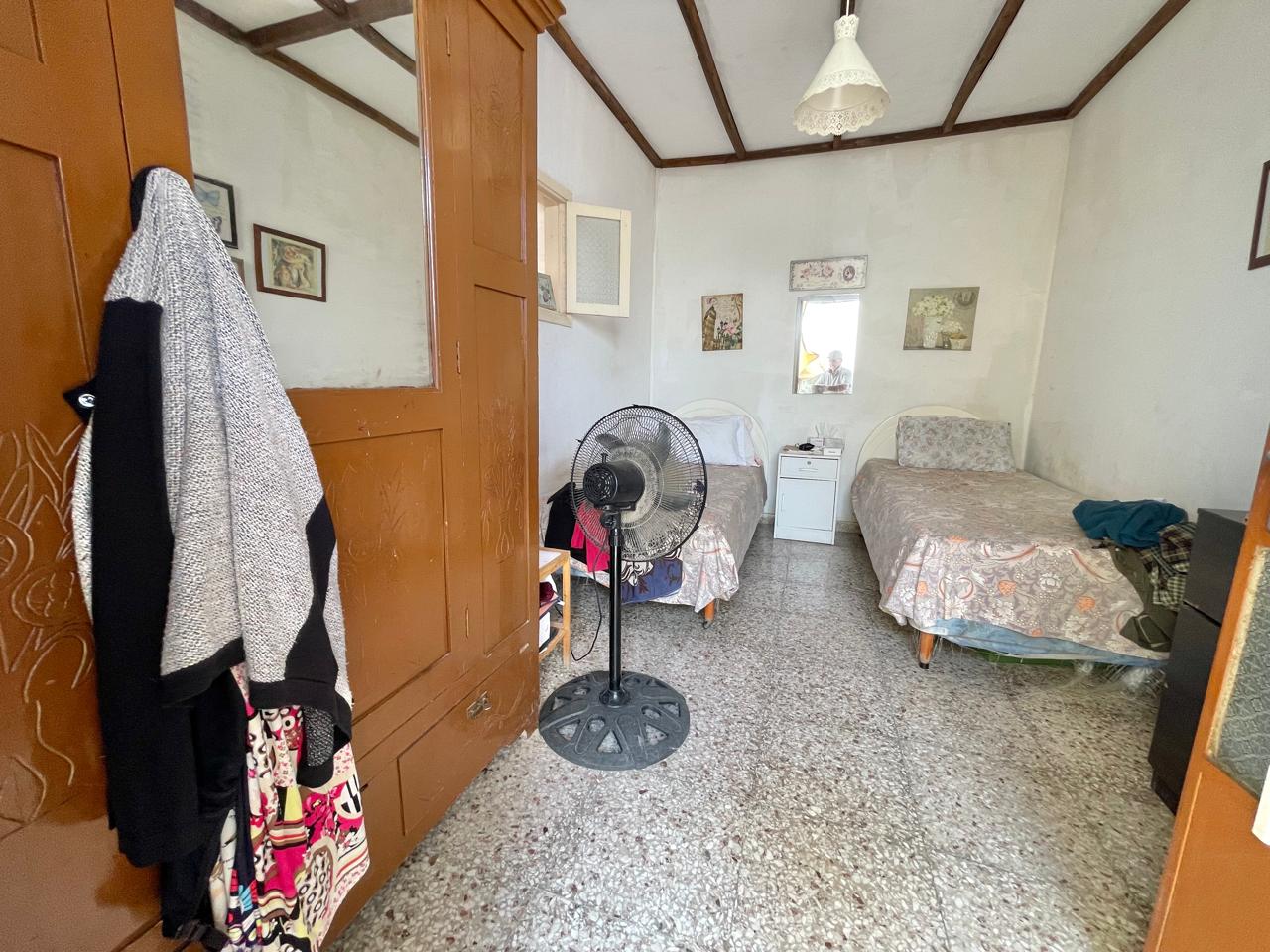 Traditional 3-Bedroom Stone Bungalow Surrounded by a Mature Garden