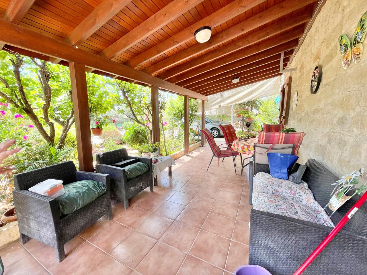 Traditional 3-Bedroom Stone Bungalow Surrounded by a Mature Garden