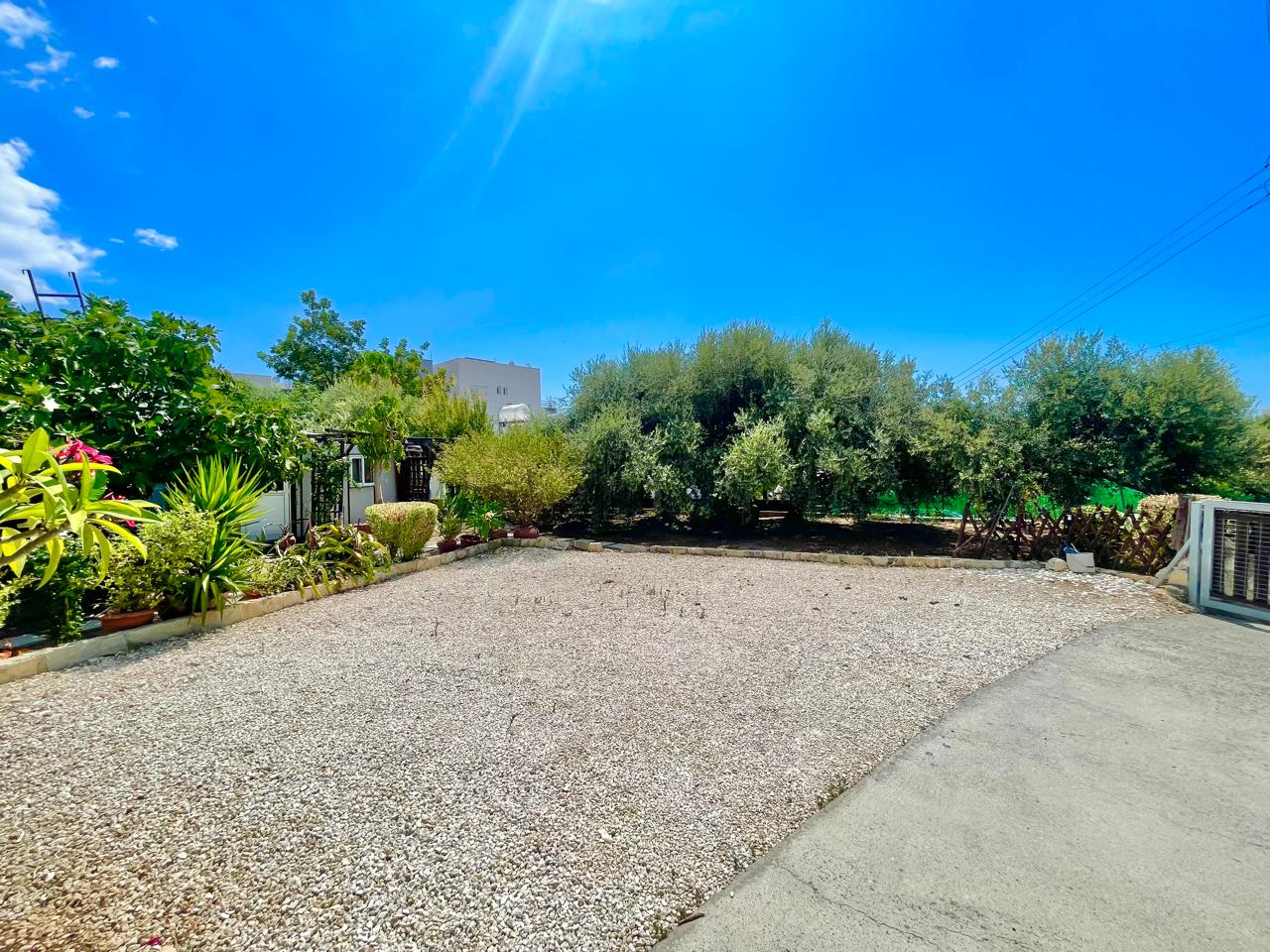 Traditional 3-Bedroom Stone Bungalow Surrounded by a Mature Garden