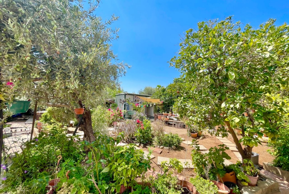 Traditional 3-Bedroom Stone Bungalow Surrounded by a Mature Garden