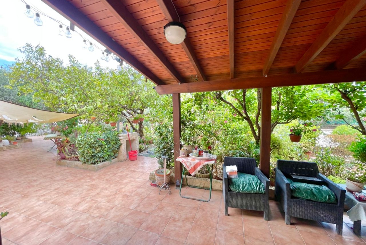 Traditional 3-Bedroom Stone Bungalow Surrounded by a Mature Garden
