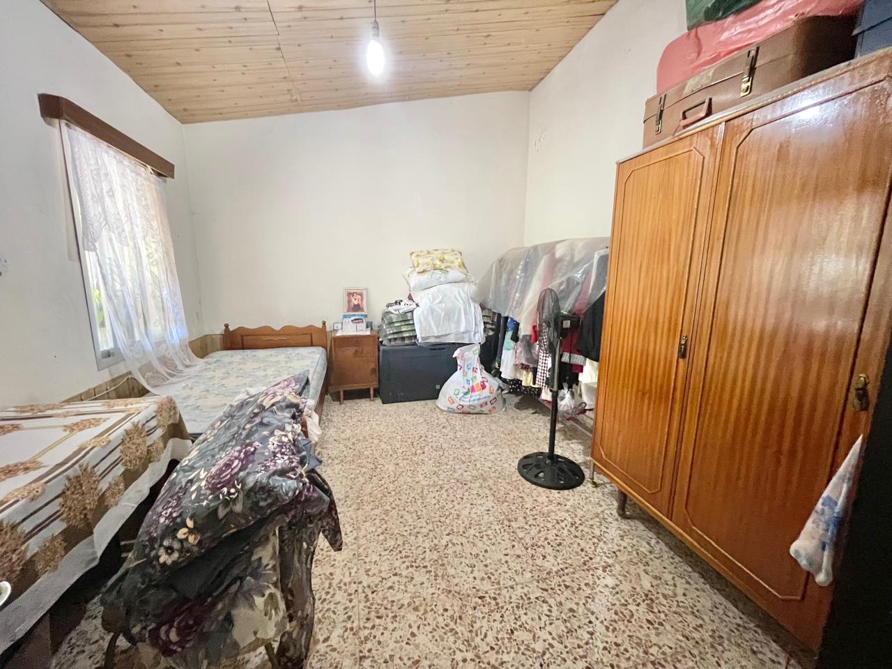 Traditional 3-Bedroom Stone Bungalow Surrounded by a Mature Garden