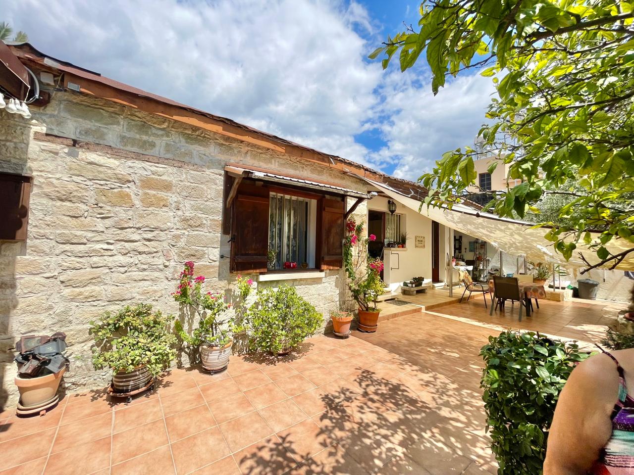 Traditional 3-Bedroom Stone Bungalow Surrounded by a Mature Garden