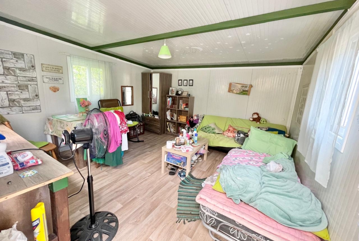 Traditional 3-Bedroom Stone Bungalow Surrounded by a Mature Garden