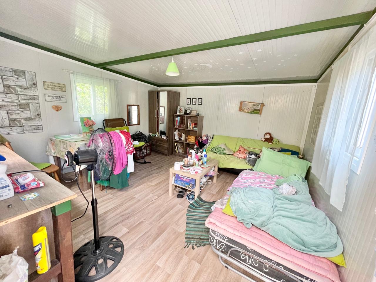 Traditional 3-Bedroom Stone Bungalow Surrounded by a Mature Garden