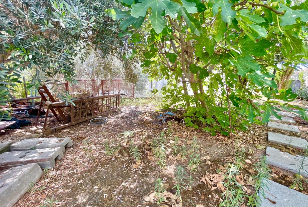 Traditional 3-Bedroom Stone Bungalow Surrounded by a Mature Garden