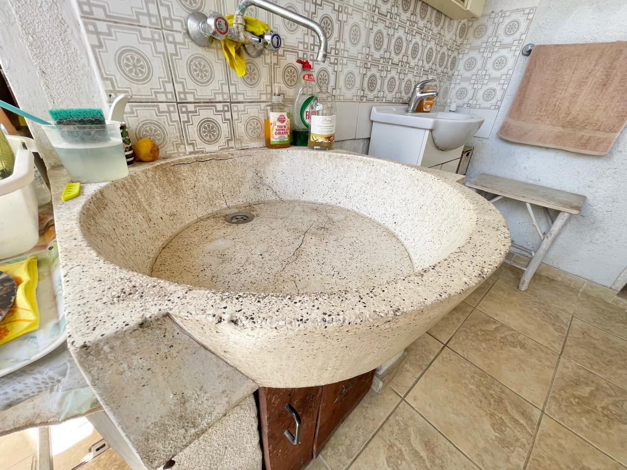 Traditional 3-Bedroom Stone Bungalow Surrounded by a Mature Garden