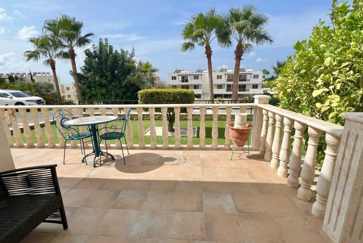 Two-bedroom villa with a private garden and communal swimming pool