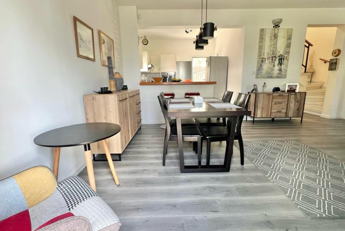 Two-bedroom villa with a private garden and communal swimming pool