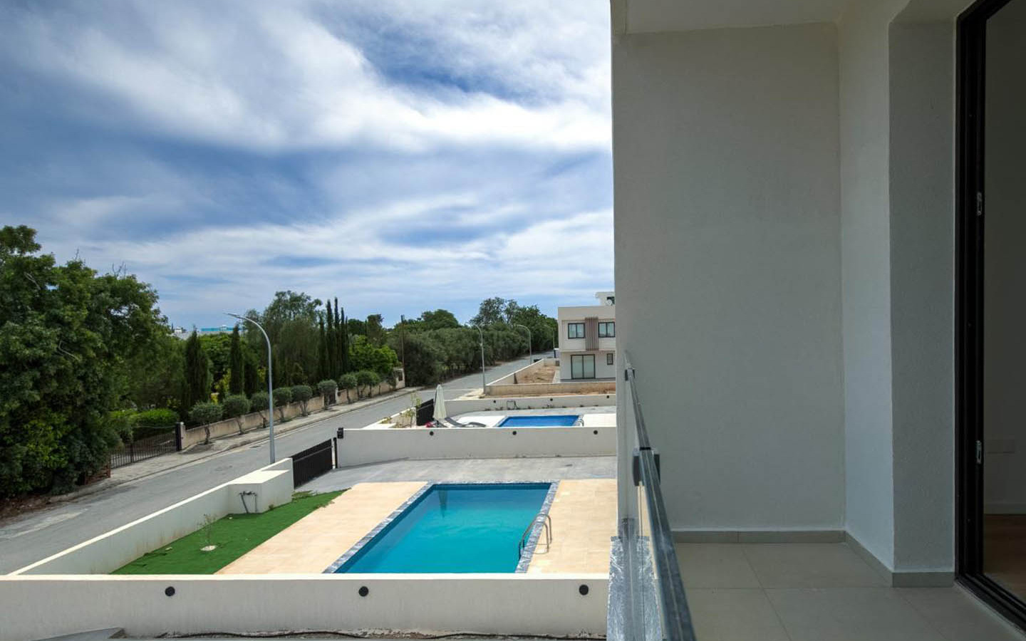 08_Exterior_new-key-ready-villa-for-sale-paphos-cyprus Contemporary Three-Bedroom Villa Overlooking an Olive Grove