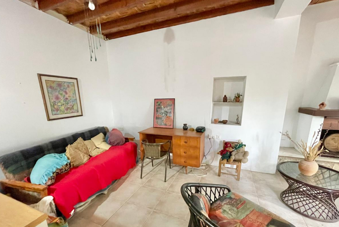 One-bedroom stone cottage with a fireplace and a beautiful green garden