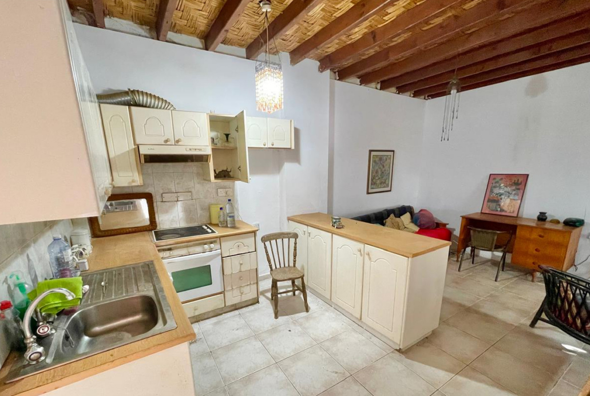 One-bedroom stone cottage with a fireplace and a beautiful green garden